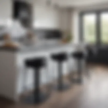 Stylish black kitchen stools with backs around a contemporary kitchen island