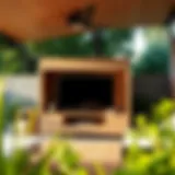 A sleek outdoor TV lift cabinet blended with natural surroundings.