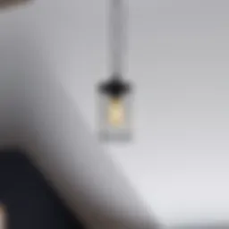 Elegant pendant light hanging from a sloped ceiling