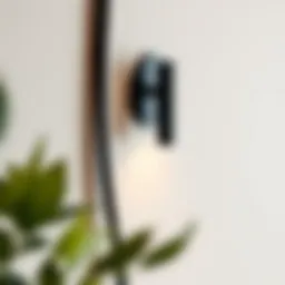 Sophisticated black metal cord cover installed along a stylish wall